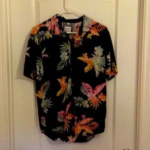 Button down Hawaiian Shirt. Black with floral print. Brand is Ricky Singh.